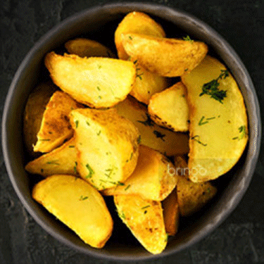 Картофель с чесноком и зеленью Shohona Oilaviy Restoran